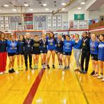 RYAN SPARKS | THE DAILY WORLD Grays Harbor College head coach Kevin Pine, far left, and the Lady Chokers won the team title at the NCWA Womens National Freestyle Invitational on Sunday at Hoquiam High School.