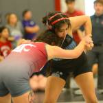 RYAN SPARKS | THE DAILY WORLD Grays Harbor Colleges Marissa Riojas, right, defeated Washington States Haley Billings during a 136-pound match at the NCWA Womens National Freestyle Invitational on Sunday at Hoquiam High School.