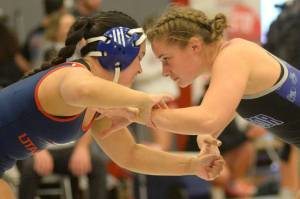 RYAN SPARKS | THE DAILY WORLD Grays Harbor Colleges Hailee Stoken, right, faces off against Utah Techs Ashley Lavarius during a 155-pound match at the NCWA Womens National Freestyle Invitational on Sunday at Hoquiam High School