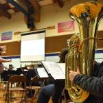Clayton Franke / The Daily World
David Mills, left, directs the Miller Jr. High School band in the debut performance of the Miller March at the schools centennial celebration on Sunday, Jan. 28.