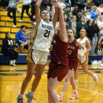 RYAN SPARKS | THE DAILY WORLD Aberdeen senior forward Jaylynn Phimmasone drives to the hoop against Hoquiams Sydney Gordon during the Bobcats 55-25 win on Monday at Aberdeen High School.