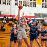 PHOTO BY VAN ADAM DAVIS Ocosta senior Alexia Bradley (30) puts up a shot while Willapa Valleys Rilyn Channell (22) defends during the Wildcats 52-47 win on Monday in Westport.