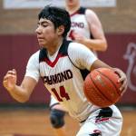 PHOTO BY FOREST WORGUM Raymond guard Chris Quintana led the Seagulls with 20 points in a 60-49 loss to Toledo in a 2B District 4 Tournament game on Saturday in Montesano.