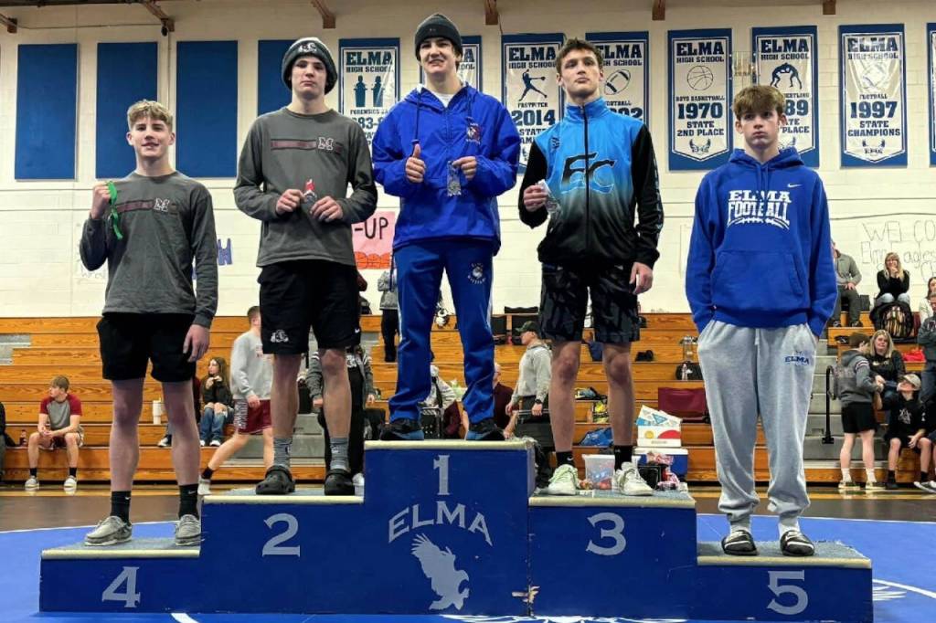 SUBMITTED PHOTO Elmas Taye Lessard (1) won the 144-pound championship at the 1A Evergreen Sub-Regionals on Saturday at Elma High School. Montesanos Kole Kjesbu (2) placed second.