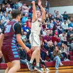 PHOTO BY FOREST WORGUM Montesano senior Tyce Peterson drains a 3-pointer during the Bulldogs 75-58 victory over Stevenson in a 1A District 4 Tournament game on Wednesday in Montesano.