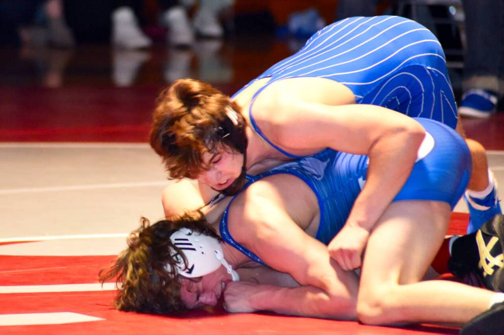 PHOTO BY SUE MICHALAK BUDSBERG Elmas Taye Lessard, top, controls La Centers Wyatt Ballard during the 144-pound final of the WIAA Region 2 Tournament on Saturday at Hoquiam High School.