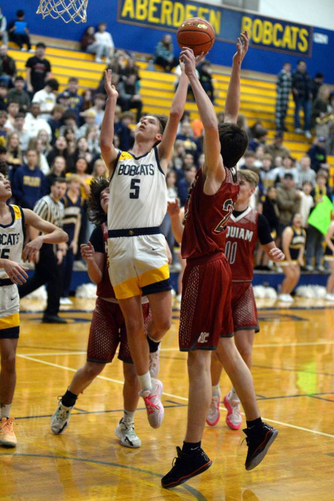 DAILY WORLD FILE PHOTO Aberdeen senior forward Baylor Ainsworth (5) was named to the 2A Evergreen All-Conference Boys Basketball Team for the 2023-24 season.