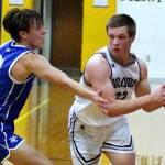 RYAN SPARKS | THE DAILY WORLD Montesano guard Peyton Damasiewicz, right, looks to pass against La Centers Jacye Grotte during the Bulldogs 70-61 victory in a 1A District 4 Tournament elimination game on Wednesday at Rochester High School.