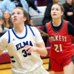 RYAN SPARKS | THE DAILY WORLD Elma sophomore Olivia Moore and Castle Rocks Sophia Buchanan during the Eagles 42-34 win in a 1A District 4 Tournament elimination game on Thursday at Montesano High School.