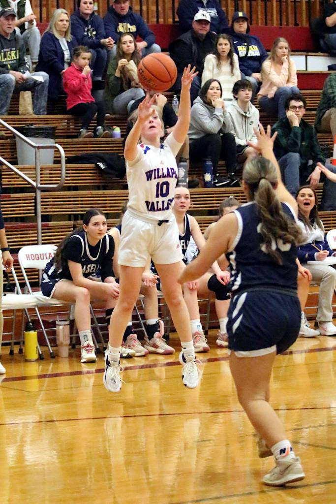 RYAN SPARKS | THE DAILY WORLD Willapa Valleys Kylee Fluke (10) shoots from long range against Naselles Gladys Wilson during the Vikings 44-34 win in a 1B District 4 Tournament elimination game on Thursday in Hoquiam.