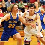 RYAN SPARKS | THE DAILY WORLD Willapa Valleys Aiden Young, right, jostles for position against Columbia Adventist Academys Tristan White during the Vikings 52-44 loss in a 1B District 4 Tournament elimination game on Thursday in Hoquiam.