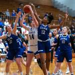 PHOTO BY FOREST WORGUM Elmas Oliva Moore (33) and Keke Bol (12) defend against Eatonvilles Lillian Bickford (14) during the Eagles 50-44 loss in a 1A District 4 Tournament game on Saturday at Hoquiam High School. Elma senior Emmie Spencer (10) looks on.