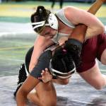 PHOTO BY SUE MICHALAK BUDSBERG Montesanos Kya Roundtree, top, controls Grandviews Ihanna Perez in a 1B/2B/1A/2A 170-pound semifinal match at the Mat Classic XXXV on Saturday at the Tacoma Dome.
