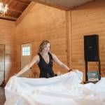 Sydney Renae Newbill handles the big and small details, such as whipping a tablecloth into shape, for her clients because she want's them to be "present" for their special day. Newbill, who is also an Aberdeen City councilor, part-time bartender and co-founder of Grays Harbor Young Professionals, has achieved much success in her young life. With her fiancée Cody Swor supporting her, there's no telling what the 26-year-old dynamo will accomplish through the next 26 years. (Chelsey McNeese of Iola Jade Images)