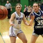RYAN SPARKS | THE DAILY WORLD Montesanos Regan Wintrip (25) defends Cascade Christians Brooklyn Whittington during the Bulldogs 41-25 win in a 1A State first-round game on Saturday at Tumwater High School.