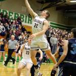 RYAN SPARKS | THE DAILY WORLD Montesano guard Peyton Damasiewicz (22) scores on a drive and layup during the Bulldogs 69-54 loss to Sultan in a 1A State Tournament first-round game on Saturday at Tumwater High School.