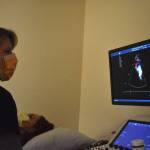 Clayton Franke / The Daily World
Jennifer Ferry, an echocardiographer at Providence Medical Groups vascular clinic in Aberdeen, demonstrates the clinics vascular ultrasound machine on Hillary Brodin, the clinics manager, on Feb. 23. Using sound waves, the machine can form images of blood flow and vein function in order to identify and assess disease.