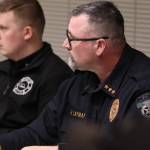 Michael S. Lockett / The Daily World
Cosmopolis Police Chief Heath Layman looks on during a meeting discussing the citys budget shortfall on Tuesday.