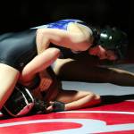 RYAN SPARKS | THE DAILY WORLD Grays Harbor Colleges Eden Lopez, left, works to pin Washington States Carlita Cardona-Arce during the 109-pound final of the NWAC Northwest Conference Championships on Saturday at Hoquiam High School.