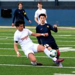 RYAN SPARKS | THE DAILY WORLD Aberdeen junior midfielder Leo Garcia (15) is fouled during a 2-0 loss to Capital on Saturday at Stewart Field in Aberdeen.