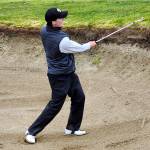SUBMITTED PHOTO Grays Harbor Colleges Cole Wasson gets out of the bunker during the University of Puget Sound Invitational on Saturday at Oakbrook Golf Club in Lakewood.