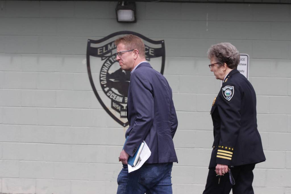 U.S. Rep. Derek Kilmer, left walks with Elma Police Chief Susan Shultz outside the citys police station in April 2023. Kilmer helped secure nearly $1.3 million for the city to renovate a new station and emergency operations center nearby. (The Daily World file photo)