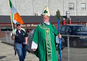 Courtesy photo / Linda Gibbons
Bill Gibbons, costumed as St. Patrick, leads a St. Patricks Day Parade from the 8th Street Ale House in Hoqiuam.