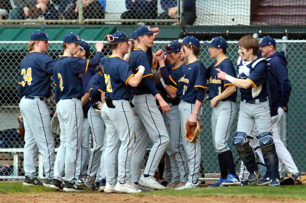 RYAN SPARKS | THE DAILY WORLD Aberdeen celebrates after recording the final out of a 16-3 mercy-rule victory over Hoquiam on Thursday at Olympic Stadium in Hoquiam.