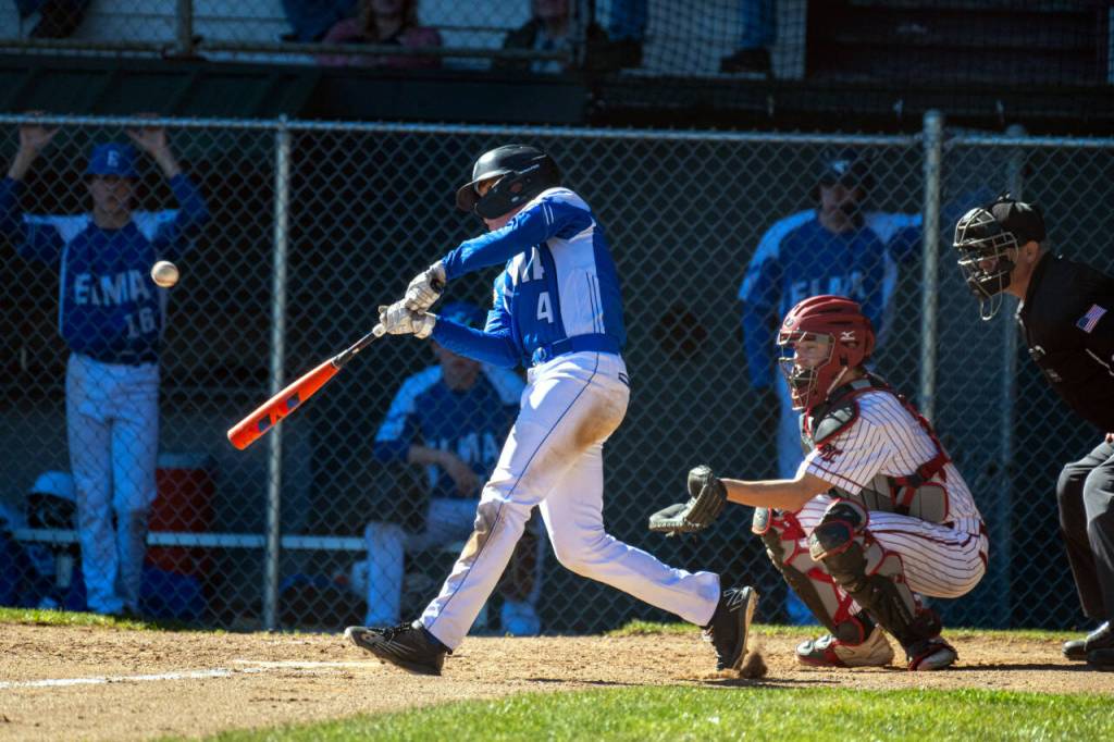 PHOTO BY FOREST WORGUM Elmas Grant Vessey connects on a pitch during a double header against Hoquiam on Saturday at Olympic Stadium in Hoquiam.