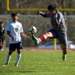 PHOTO BY FOREST WORGUM Hoquiams Jose Fabian leaps to make a play during the Grizzlies 2-1 overtime victory over Forks on Saturday in Hoquiam.