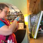 Matthew N. Wells / The Daily World
Stephanie Navarra, looks through one of the shelves within Melinda Einanders independent bookstore, Harbor Books  2200 Simpson Ave., in Hoquiam. Navarra loved spending time in the shop with a curious and wandering toddler, as they helped Aberdeen Cash Mobs goal of boosting small business on the Harbor.