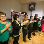 Many of the core members from 100+ Harbor Women Who Care applaud the courage of a domestic violence survivor who shared her store of what she and her young children faced for years before they were able to leave. In the span of less than a year, the survivors have contacted Domestic Violence Center of Grays Harbor (DVC) and started their road to a life of new possibilities. (Matthew N. Wells / The Daily World)