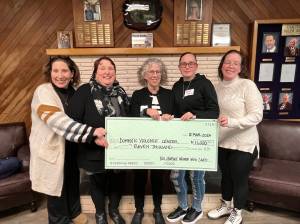 Matthew N. Wells / The Daily World
Domestic Violence Center of Grays Harbor (DVC) was the big winner at the 100+ Harbor Women Who Care event March 12. While the big check here doesnt show it, DVC got $37,240 to date, combined donor sources. One survivor who bravely shared a story that will make anyone with an empathetic nature cry. Thankfully for her and her children, theyre out of that situation and are on the way to a life of peace, thanks to DVC.