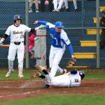 RYAN SPARKS | THE DAILY WORLD Aberdeens Sam Schreiber (8) beats the tag of Elma relief pitcher Carter Studer during the Eagles 5-3 win on Friday at Pioneer Park in Elma.