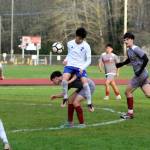 RYAN SPARKS | THE DAILY WORLD Elmas Ivan Rodriguez, top, and Hoquiams Michael Garcia, bottom, compete for a loose ball during Elmas 3-0 win on Friday in Hoquiam.