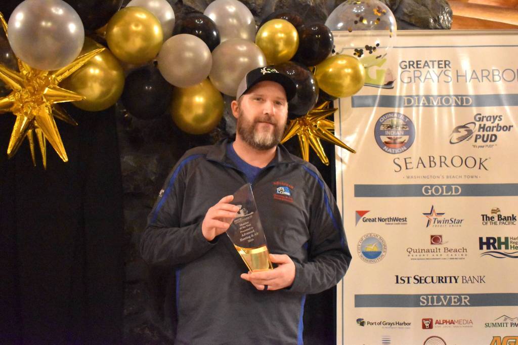 Matthew N. Wells / The Daily World
Kary Kugan, assistant general manager for Advanced Heating & Air, Inc., (AHA) accepts the award for Greater Grays Harbor, Incs Member of the Year award at GGHIs 2024 Leaders Celebration. Kellie Larson, owner of AHA, noted something special about the timing of the award. Receiving this award on our 20-year anniversary is truly a blessing and it wouldnt have been possible without our amazing customers and the support from the community of Grays Harbor, Larson said. AHA beat out The Moore Wright Group, La Spiaggia Ristorante, and Renaes Rendezvous.