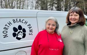 Michael S. Lockett / The Daily World
Carol Jamroz, right, will take over as president of North Beach PAWS from Lorna Valdez, left, who helped found and shape the shelter.