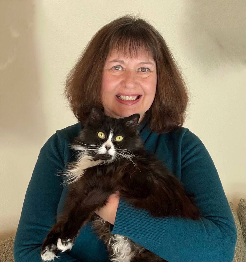 New president of North Beach PAWS Carol Jamroz poses with rescue cat Morag. (Carol Jamroz)