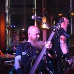 Matthew N. Wells / The Daily World
On Saturday, Eric Thomas, bassist for ANTIHERO, provided a thundering bass, sound for the band, while Timmy Silvers, right, riffed and shredded his way through their set. Jason VanEss, left, literally lit his drums ablaze in a controlled burn. ANTIHERO, who later dubbed themselves the Motörhead of Tacoma, shared a double headline show with A Lien Nation. Dustin Adair opened the show with a very popular acoustic set.