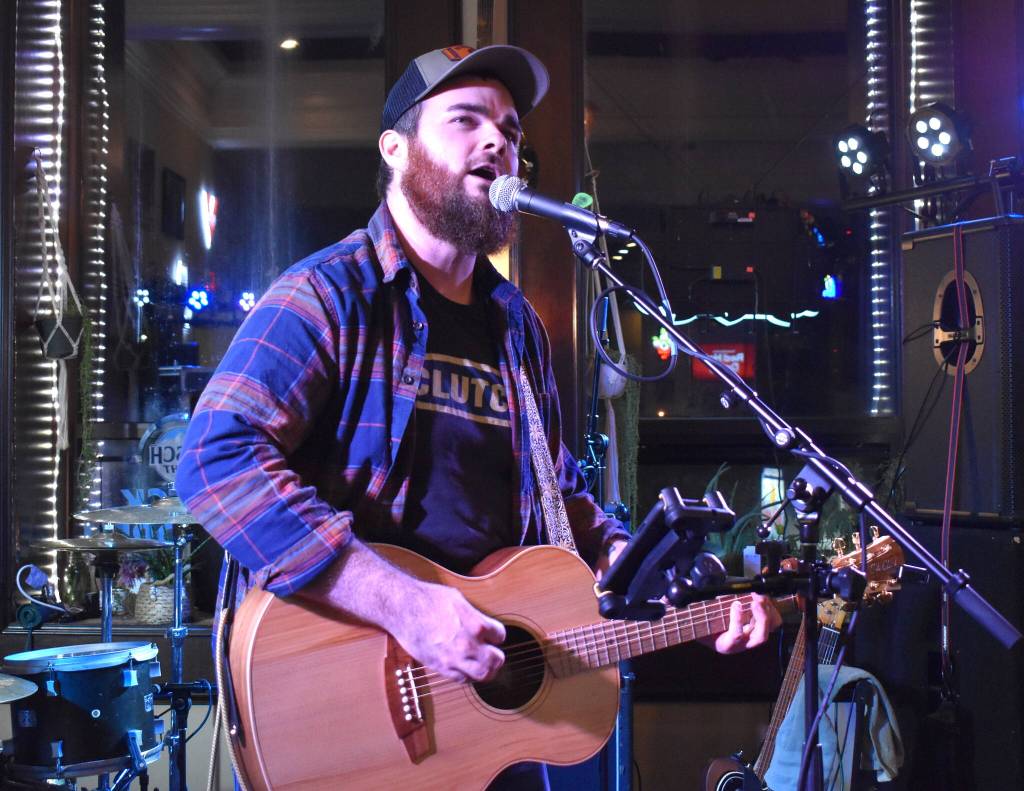 Matthew N. Wells / The Daily World
Dustin Adair captivated the intimate crowd at Messy Jessys with his powerful voice, strong stage presence and keen guitar work. Dustin Adair was someone I was not familiar with but Im glad I heard him on that stage, said Shana Denny, an audience member at the Saturday night show. He opened with some straight up noodling on the guitar in country tunes with that classic low, soothing voice and swagger. It drew me in and I had to dance.