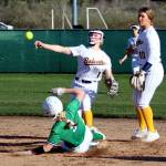 RYAN SPARKS | THE DAILY WORLD Aberdeen shortstop Zoe Vessey (1) throws to first to complete a double-play against Tumwaters Erika Schock (9) during the sixth inning of a 5-0 loss to Tumwater on Friday in Aberdeen.