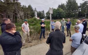 John Shaw
Marc Titus, a community wildfire resilience specialist with the Department of Natural Resources, talks with a group of local leaders and fire officials about wildfire risk in Westport at the Grays Harbor Lighthouse on Aug. 10, 2023.