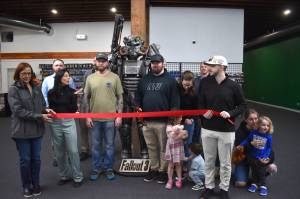 Matthew N. Wells / The Daily World
Game Freaks representatives and Greater Grays Harbor, Inc. ambassadors meet up for a ribbon-cutting to usher in the new era of Game Freaks in Aberdeen  110 E. Wishkah St.