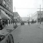 Polson Museum
This archival photo shows various modes of transportation near the intersection of East Heron and South H St., circa-1910. You can see bicycles, horse-drawn vehicles, and early street sweeper and an automobile. This is part of Polson Museums new centerpiece exhibit titled The Spectacular Vanishes: When Horses Left the Harbor.