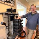 Matthew N. Wells / The Daily World
John Larson, director of Polson Museum  1611 Riverside Ave., in Hoquiam  shows off a cleaned up 1924 Franklin 6-cylinder engine 10-C. The motor was used to power a Franklin car, which was a very high end car back in those days.