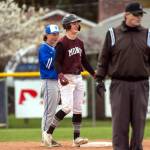 PHOTO BY FOREST WORGUM Montesanos Christian Morris celebrates after hitting a double in a victory over La Center on Friday in Naches.