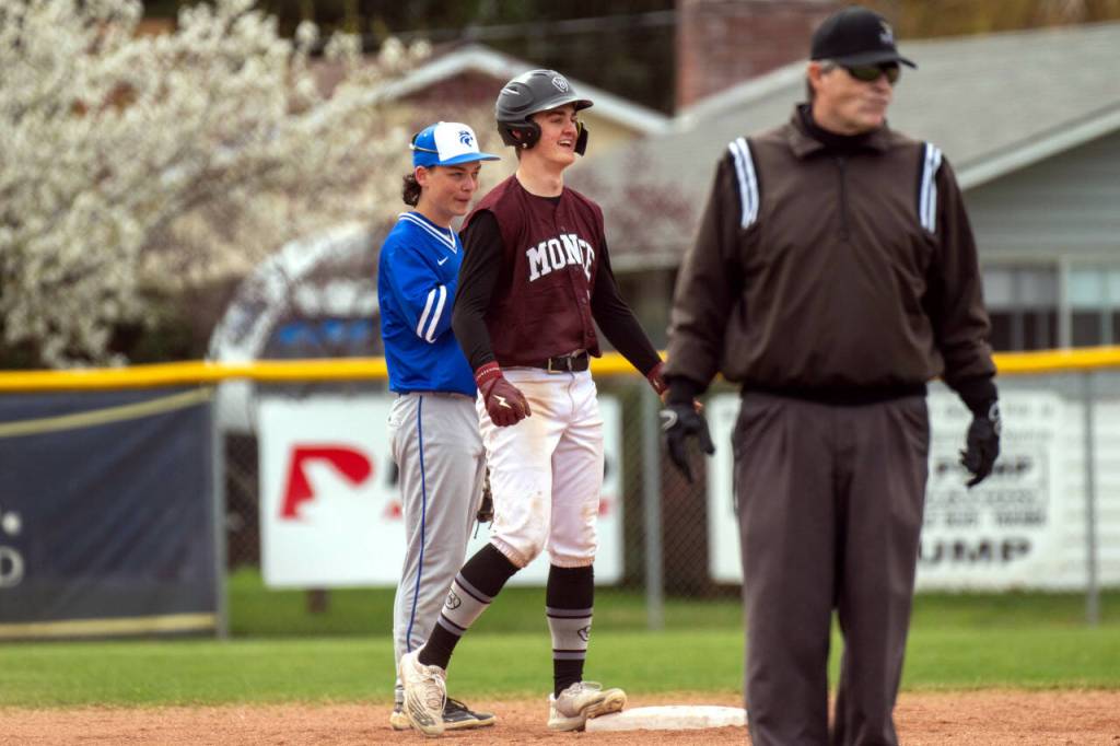 PHOTO BY FOREST WORGUM Montesanos Christian Morris celebrates after hitting a double in a victory over La Center on Friday in Naches.
