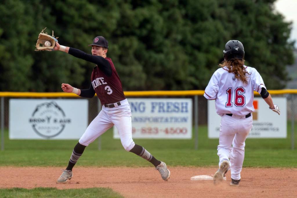 PHOTO BY FOREST WORGUM Montesano shortstop Bode Poler fields a throw during a victory over Colville on Friday in Naches.