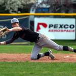 PHOTO BY FOREST WORGUM Montesano shortstop Bode Poler makes a diving stop during a 5-1 win over Naches Valley on Saturday at the Ranger Baseball Field in Naches.