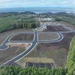 KUOW
Streets for a new neighborhood in the new upper village of Taholah have already been laid out, but the Quinault Indian Nation still needs to clear trees to make room for a the new school, which is in the early stages of design.